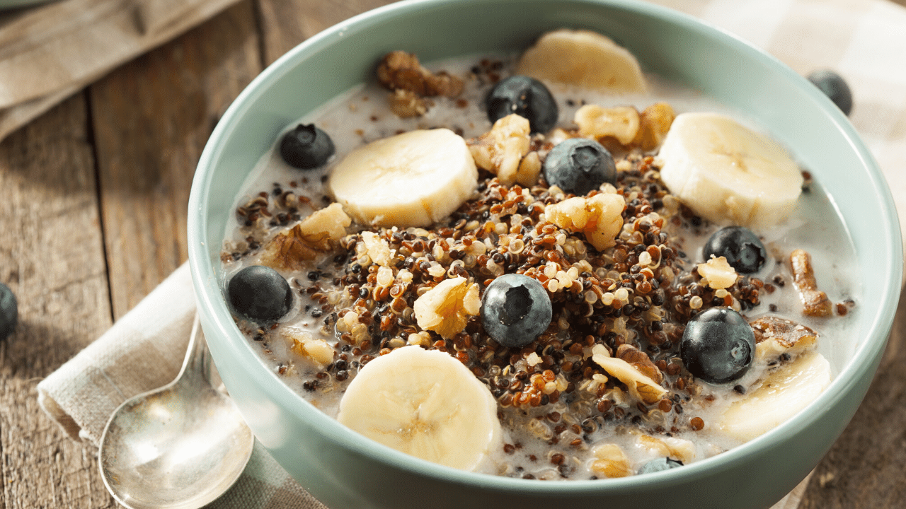 hot quinoa breakfast cereal with organic blueberries and bananas